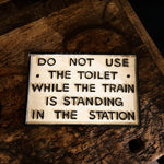 Antiqued Toilet Warning Sign